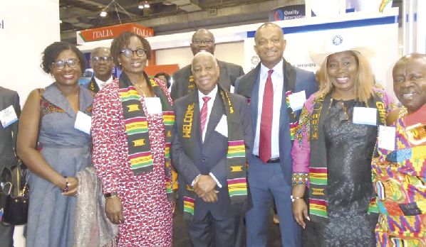 Mr Kweku Awotwi (3rd right), Ms Cynthia Lumor (2nd left) of Tullow, Ogyeahoho Yaw Gyebi II (right), the President of the Western Regional House of Chiefs, Mr Sekyere Abankwah (3rd left), the Board Chairman of the Petroleum Commission. Behind Mr Abankwah is Mr Egbert Faibille Jnr. with other members of the Ghana team after the ceremony