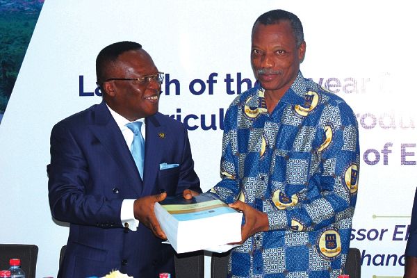 Mr Felix Nyarko-Pong (left), Advisory Board Chair, College of Education, handing over the new curriculum of the new 4-year Bachelor of Education (B.Ed) programme to Prof. Patrick Ferdinand Ayeh-Kumi, Provost, College of Health Science, University of Ghana.  Picture: Maxwell Ocloo