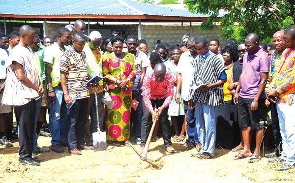 The MCE for Lower Manya Krobo Mr Simon Kweku Tetteh breaking the ground for commencement of the project.