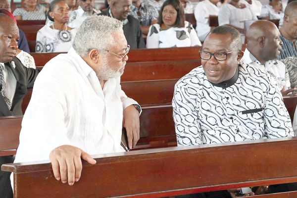 Former President Rawlings with Mr Ofosu Ampofo (right), Chairman of the NDC, at the memorial mass