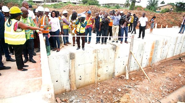 Mrs Cecilia Abena Dapaah (left) explaining the progress of work to President Nana Addo Dankwa Akufo-Addo. Picture: SAMUEL TEI ADANO