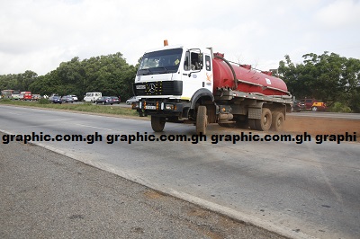 A tanker driver turning at the median of the Motorway towards Tema.