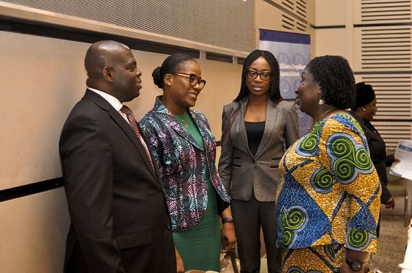 Mrs Akwelley Bulley (2nd left), Director, Human Resources, UMB Bank, interacting with Mrs Rose Kakari-Annan (right), Mr Alex Frimpong (left) and Ms Hannah Ashiokai Akrong (2nd right), Director, Human Resources, Vodafone Ghana. Picture: NII MARTEY M. BOTCHWAY