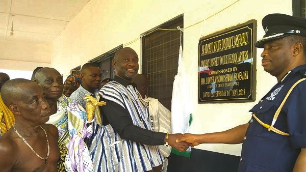  Mr Wisdom Semanu Seneadza handing over the keys to the police station to Assistant Commissioner of Police (ACP) Martin Ayiih