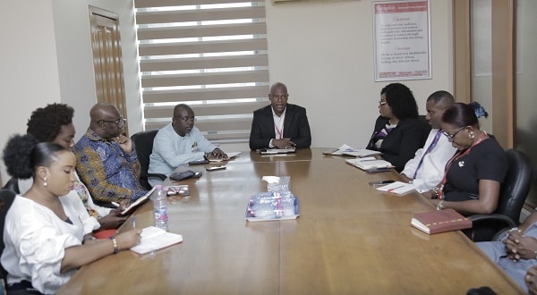 Mr Ato Afful (head of table), MD, GCGL, addressing the GTA delegation when it paid a courtesy call on him at the GCGL Head  Office in Accra. 