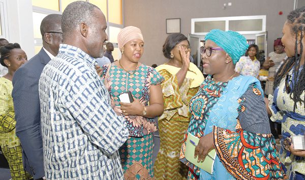  Hajia Alima Mahama (2nd right), the Minister of Local Government and Rural Development, interacting with some participants when she took her turn at the Meet-the-Press series in Accra yesterday. Picture:  EBOW HANSON