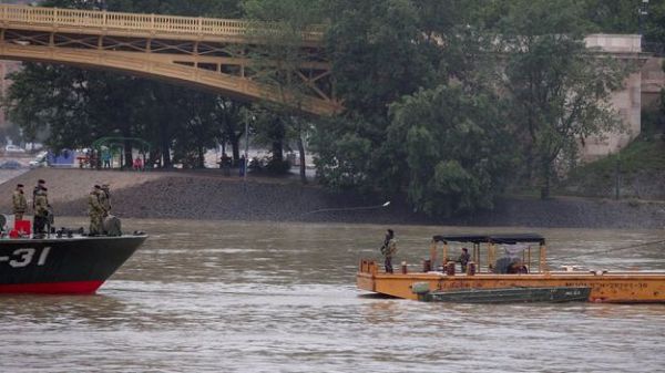 A rescue team scours the Danube for survivors