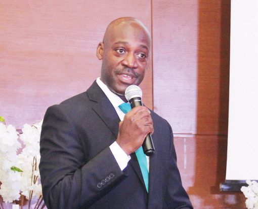  Mr Albert Harrison Nkansah (left), CEO, Bedrock Insurance Limited, addressing guests at the launch. Pictures: BENEDICT OBUOBI