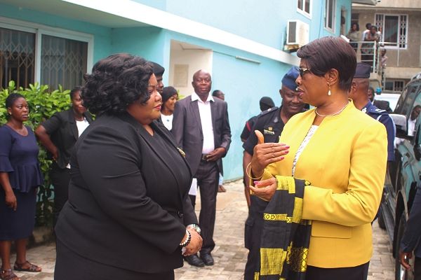 Ms Justice Sophia Akuffo (right), the Chief Justice, interacting with Ms Sedinam Awo Baloka (left), a Magistrate at the Teshie Nungua District Court. 