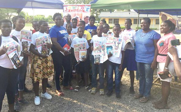 The contestants of the Junior Graphic Reading and Spelling Competition with the Executive Director of the Nneka Youth Foundation, Mrs Cecilia Fiaka (second right), and Ms Yvonne Aryee (arrowed) of the Corporate Communications Unit of the GCGL.