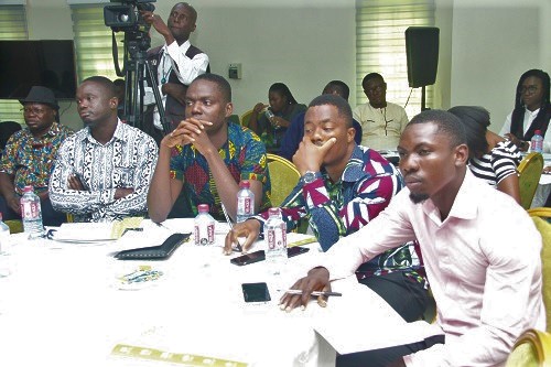 Dr Nicholas Awotwi (left), Director, Institute of Local Government Studies making a presentation at the roundtable discussion on ‘Multi-Party Decentralised Local Governance System in Ghana’ in Accra. Picture: BENEDICT OBUOBI