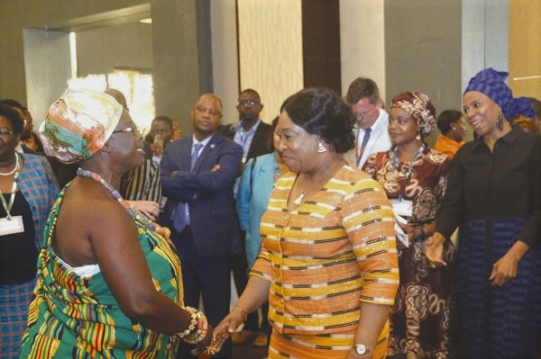  Ms Shirley Ayorkor Botchwey exchanging pleasantries with Nana Amba Eyiaba (left), Krontihemaa of the Oguaa Traditional Area, after the meeting
