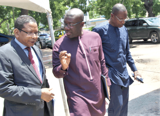  Mr Kojo Oppong Nkrumah (middle), Minister of Information, having a chat with Mr Abdourahamane Diallo (left), UNESCO Head of Office, at the function. With them is Mr Roland Affail Monney(right), President of the Ghana Journalists, Association.