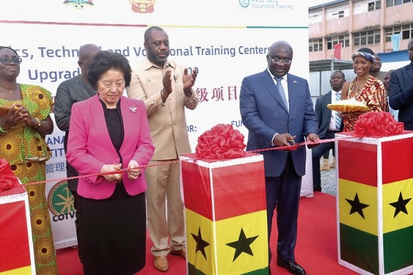 Vice-President Mahamudu Bawumia (right) and Ms Sun Chunlan (left), Vice-Premier, Republic of China, jointly cutting the tape for the commencement of the project at the Tema Technical Institute. 