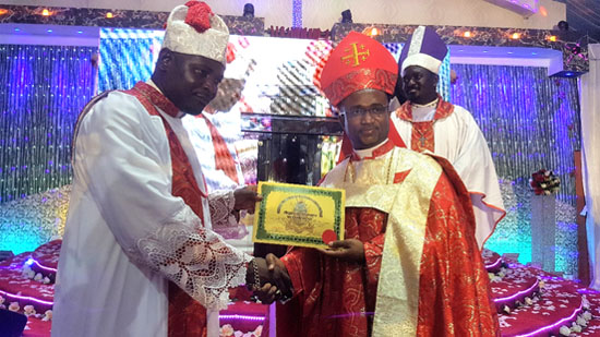 Bishop Dr. Charles C. Hackman receiving an award from Calvary Cross Clergy Council and Bible seminary