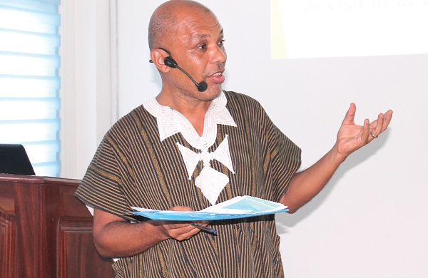 Mr Abraham (inset), the CEO of HJA Company, explaining the benefits of the new wood vinegar fertiliser to participants in the fifth West African Organic Agriculture Conference