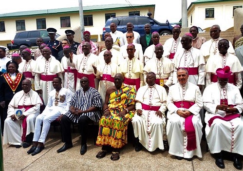 Most Rev. Philip Naameh, President of the Ghana Catholic Bishops Conference (3rd right), Mr Kwamena Duncan (2nd left), Central Regional Minister, and Osabarimba Kwesi Atta II (middle), the Omanhen of the Oguaa Traditional Area, with members of the conference