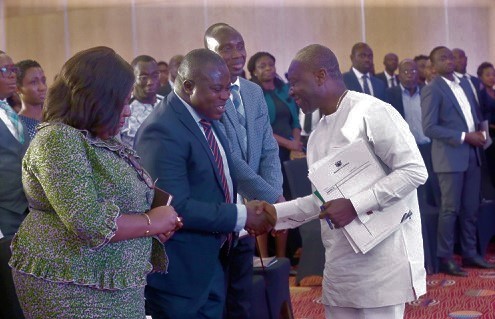 Mr Ken Ofori-Atta, the Finance Minister, exchanging pleasantries with guests after the KPMG 2020 Budget Forum in Accra. Picture by SAMUEL TEI ADANO