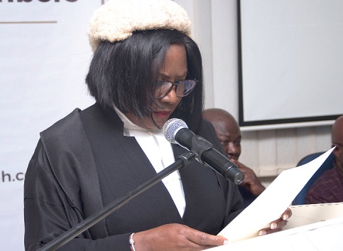 Justice Barbara F. Ackah Yensu administering the oath of office to the new members of the Council on Foreign Relations at the induction ceremony in Accra
