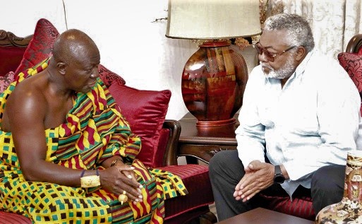 Otumfuo Osei Tutu (left) in discussions with former President J. J. Rawlings