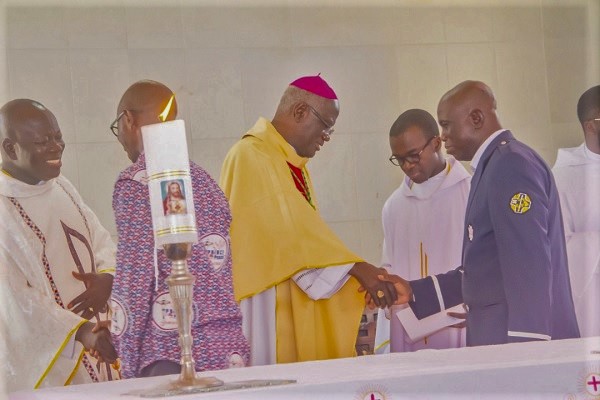  Most Rev Kwofie (left) exchanging pleasantries with some leaders of the parish