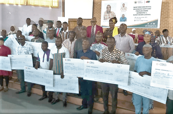 Dr Ibrahim Mohammed Awal with some of the beneficiaries