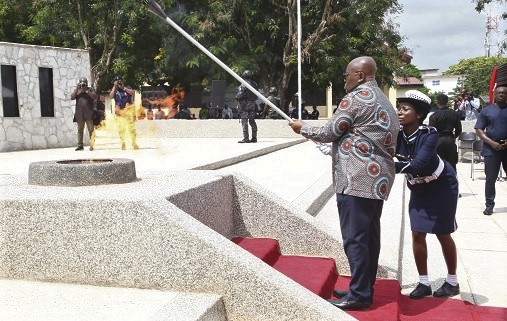 President Nana Addo Dankwa Akufo-Addo lighting the flame to mark Memorial Day at the Cenotaph Grounds at the Police Training School in Accra