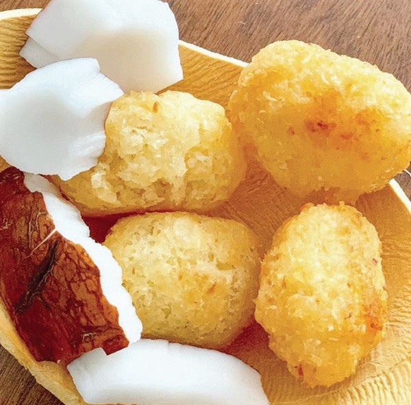 A serving of Agbelikaklo and dried coconut