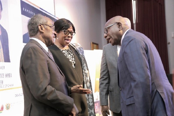  Ms Justice Sophia A.B. Akuffo (2nd left) interacting with Mr Felix Addo (right) and Prof. Justice Samuel Date-Bah, a former Justice of the Supreme Court, after the GARIA conference. 