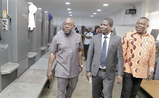From left to right; Mr Kojo Oppong Nkrumah, Mr David Boateng Asante, Managing Director, Ghana Publishing Company Limited (GPCL), and Mr Stephen Asamoah Boateng inspecting the Heidelberg speedmaster five-colour machine during the inauguration ceremony.