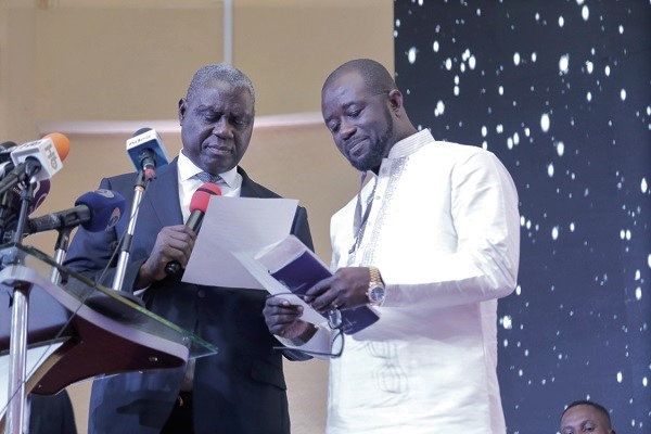 Kurt Okraku (right) being sworn-in as the 24th President of the GFA