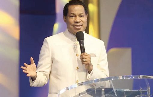  Pastor Chris ministering at the event.