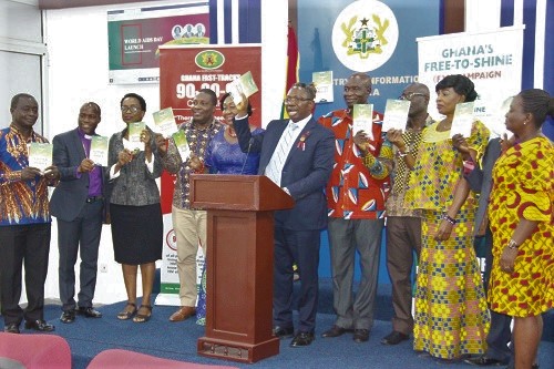 Mr Kyeremeh Atuahene (5th right), Acting Director General, Ghana Aids Commission (GAC); Dr Mokowa Blay Adu-Gyamfi (5th left), Presidential Advisor on HIV; Mrs Elizabeth Naa Tsotso Sackey (2nd right), Deputy Greater Accra Regional Minister; Dr Kwadwo Appiah-Kubi (4th right), a Member of the Ghana Aids Commission (GAC) Governing Board and MP for Atwima Kwanwoma Constituency and other dignitaries launching the National HIV& AIDS Policy after the launch of the World Aids Day. Picture: EDNA ADU-SERWAA
