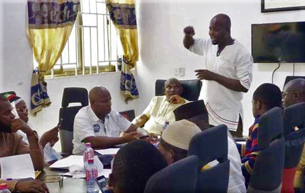 Alhaji Nuru Hamidan (standing) addressing NDC Zongo Caucus meeting