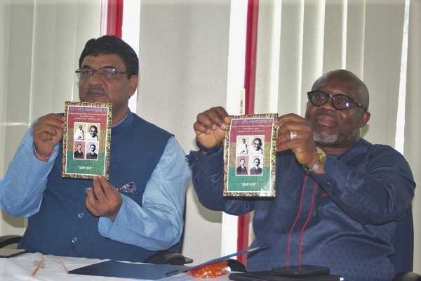  Mr Birender Singh Yadav (left), Indian High Commissioner to Ghana and Mr George Andah (right), Deputy Minister of Communications, jointly launching the stamps to commemorate the 150th birthday of Mahatma Gandhi in Accra. 