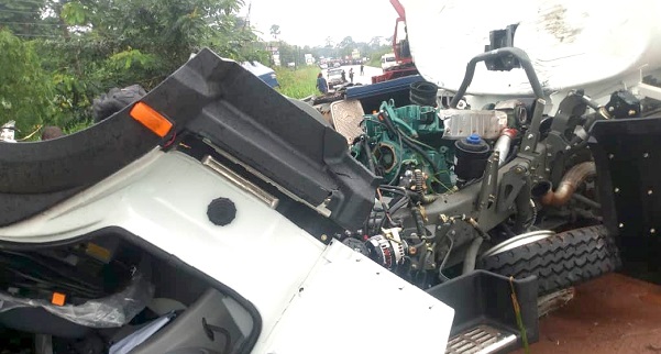 The badly damaged van at the accident scene