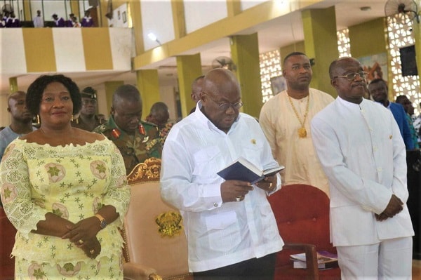 President Nana Addo Dankwa Akufo-Addo (middle) singing a hymn during Sunday's service at the St Cyprian's Anglican Church in Kumasi. Flanking him are Mr Simon Osei Mensah, the Ashanti Regional Minister, and Nana Adwoa Dokua, a Board Member of COCOBOD