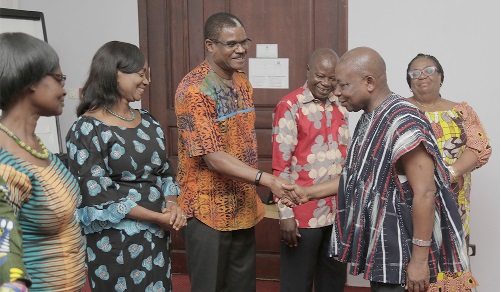  Mr Kweku Agyeman-Manu (right), the Minister of Health, congratulating the steering committee members after the inauguration ceremony