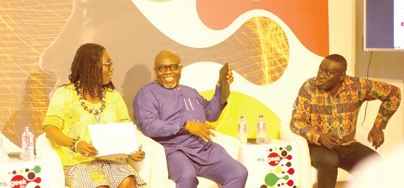  Mrs Ursula Owusu Ekuful (left), the Minister of Communications, in a chat with Mr George Andah (2nd right), a Deputy Ministers of Communications, and Mr Abraham Kofi Asante (right), the Chief Executive Officer, the Ghana Investment Fund for Electronics Communication, after the launch of the Ms Geek Ghana competition.