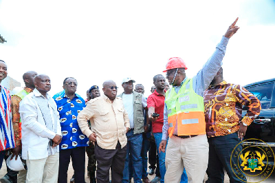 President Nana Addo Dankwa Akufo-Addo and his entourage being briefed at a project site