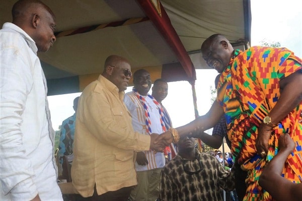Nana Bi Kusi Appiah II (right), the Chief of Manso Nkwanta,  welcoming President Akufo-Addo to a durbar at Manso Nkwanta.  Those with the President include, Mr Simon Osei Mensah (left), the Ashanti Regional Minister, and Mr Albert Qwarm,  the MP for Amansie West. Picture: EMMANUEL BAAH