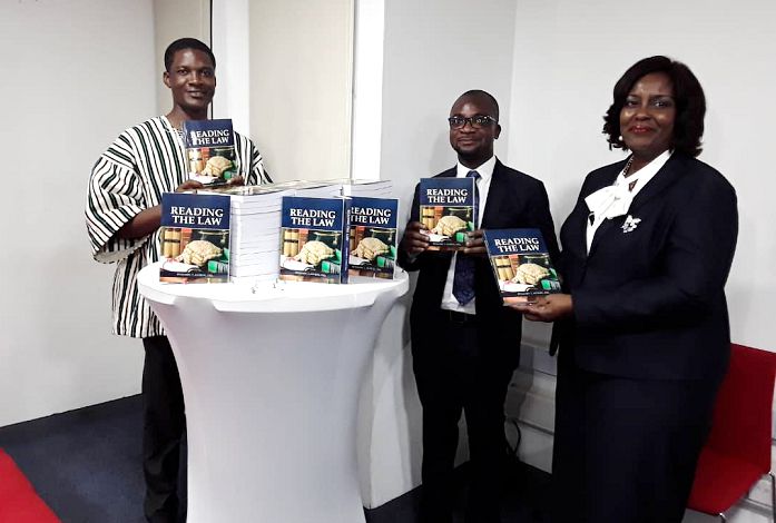 The author, Mr Benjamin Tachie Antiedu (middle) with the President of the Greater Accra Regional Branch of the Ghana Bar Association,  Mrs Efua Ghartey, and Resident Pastor of the PIWC, Pastor O.S. Kwarteng