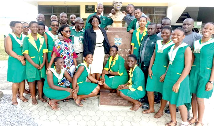 Students, teachers of Wesley Girls High School and officials of AGAMAL after the spraying exercise