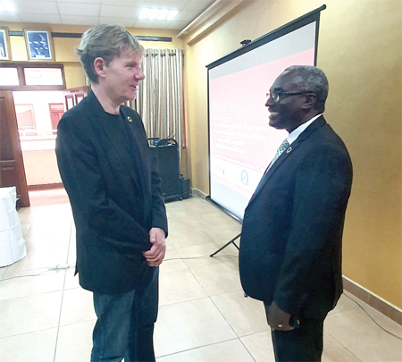 The President of the Copenhagen Consensus Centre, Mr Bjorn Lomborg (left), interacting with the Director-General of National Development Planning Commission (NDPC), Dr Kodjo Mensah-Abrampa 