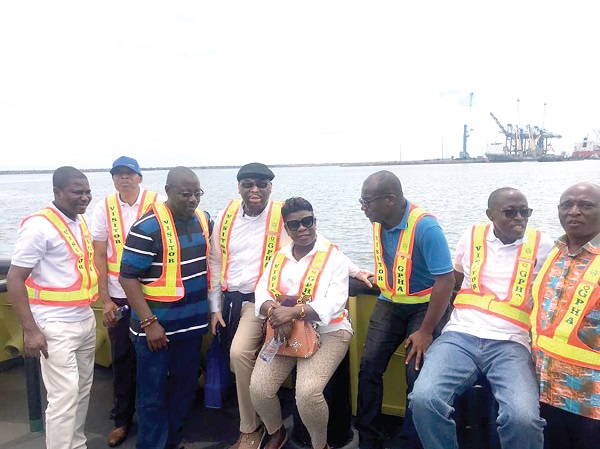 Ms Benonita Bismarck (4th right) interacting with some of the judges on board a moving vessel at the Tema Port