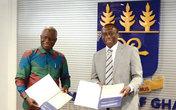 Mr Fred Oware (left) and Prof. Francis Dodoo displaying the signed MoU