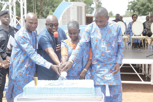Mr George Andah (2nd left), assisted by Prof. Kwasi Ansu-Kyeremeh (left), Prof. Kwamena Kwansah-Aidoo (right) and Ms Ajoa Yeboah-Afari, Alumni representative, Ghana Institute of Journalism (GIJ) Governing Council, to cut the 60th anniversary cake during the grand durbar to celebrate GIJ’s 60th anniversary at the GIJ New Site, North Dzorwulu, Accra.