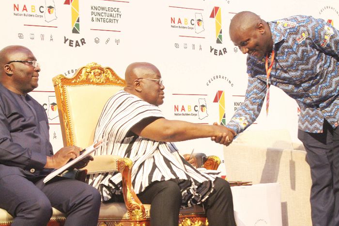 President Akufo-Addo exchanges pleasantries with Dr Anyas Ibrahim (right), CEO, Nation Builders Corps, at the launch. With them is Dr Mahamudu Bawumia. Picture: SAMUEL TEI ADANO