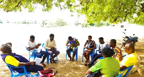  The UNFPA team meeting with some of the youth volunteers in Kongo