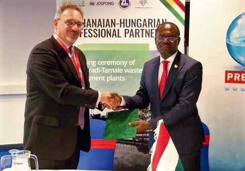 Mr Joseph Siaw Agyepong exchanging the MoU with Mr István Joó after the ceremony
